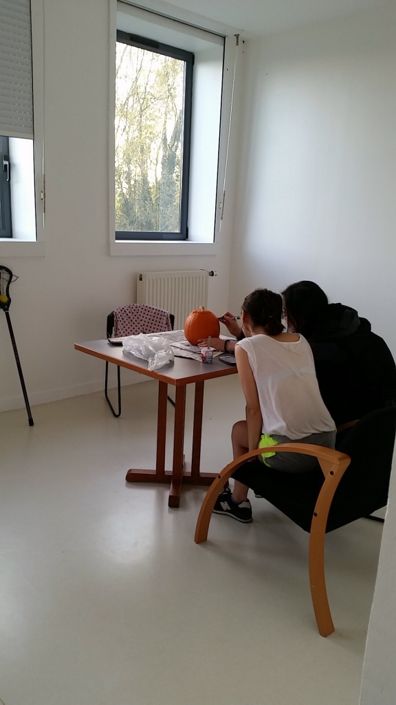 Working on their pumpkin!